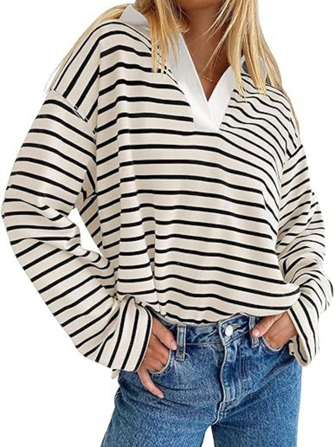Oversized striped long-sleeve sweatshirt in cream with black horizontal stripes and a white collar.