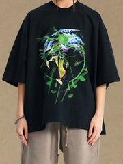 Black oversized tee with a bold graphic print of a roaring leopard with green lightning accents.
