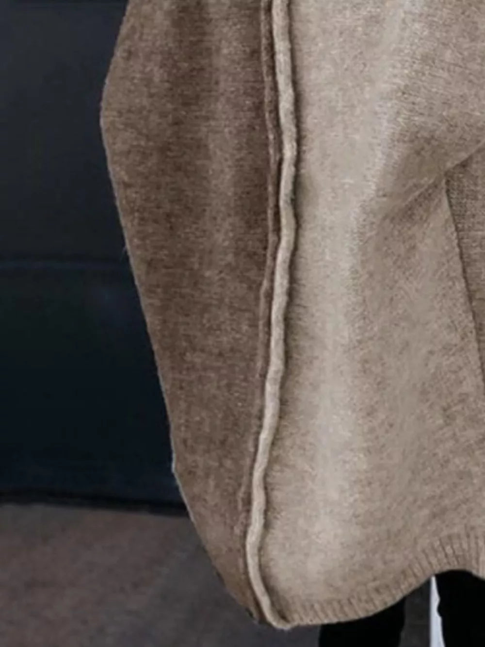 Two-tone hooded knit cardigan in camel and brown acrylic with contrast stitching detail.