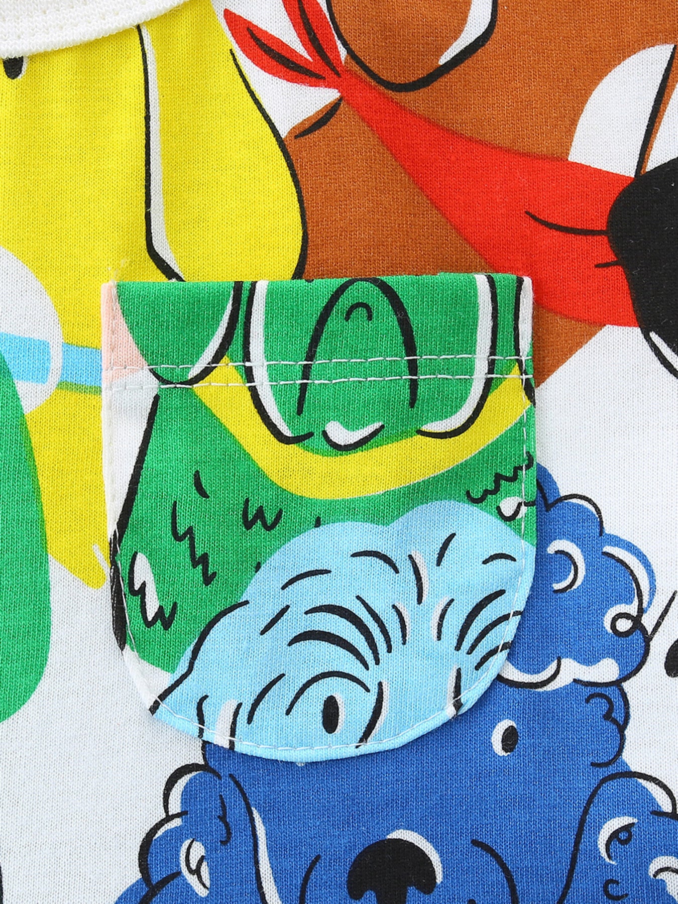 Toddler dress with cartoon dog print and green pocket.