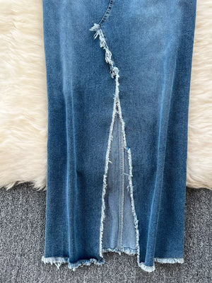 Blue denim maxi dress with frayed hem and cutout detail