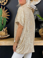 Brass sequin slouchy v-neck top with short sleeves, styled casually.