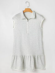 Light gray zip front cap sleeve dress with ruffled hem