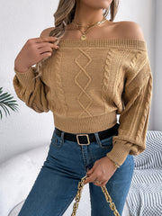 Camel cable knit off-shoulder crop sweater with diamond pattern and balloon sleeves.