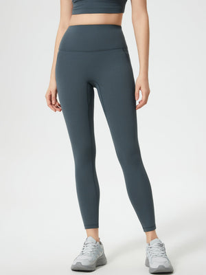 Sculpted contour leggings in dark gray with pocket detail and high waist.