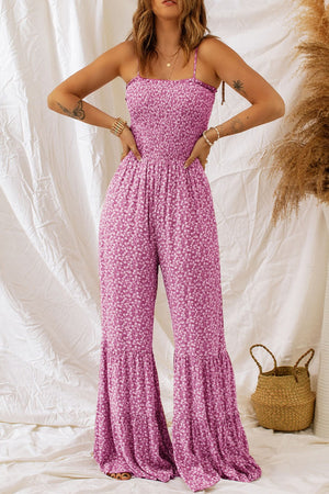 Hot Pink floral smocked bodice flare-leg jumpsuit with tiered ruffle hem.
