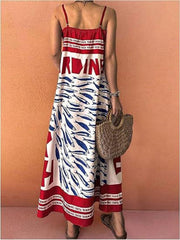 Spaghetti strap maxi dress with blue sardine print and red trim.