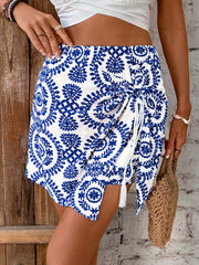 Blue floral tie skort with drawstring and tassel detail.