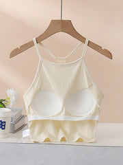 Cream ribbed racerback crop top with built-in cups and a keyhole back detail.