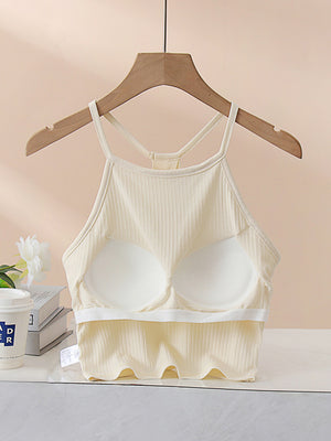 Cream ribbed racerback crop top with built-in cups and a keyhole back detail.