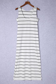 White and black striped maxi dress with a V-neck and side slits.