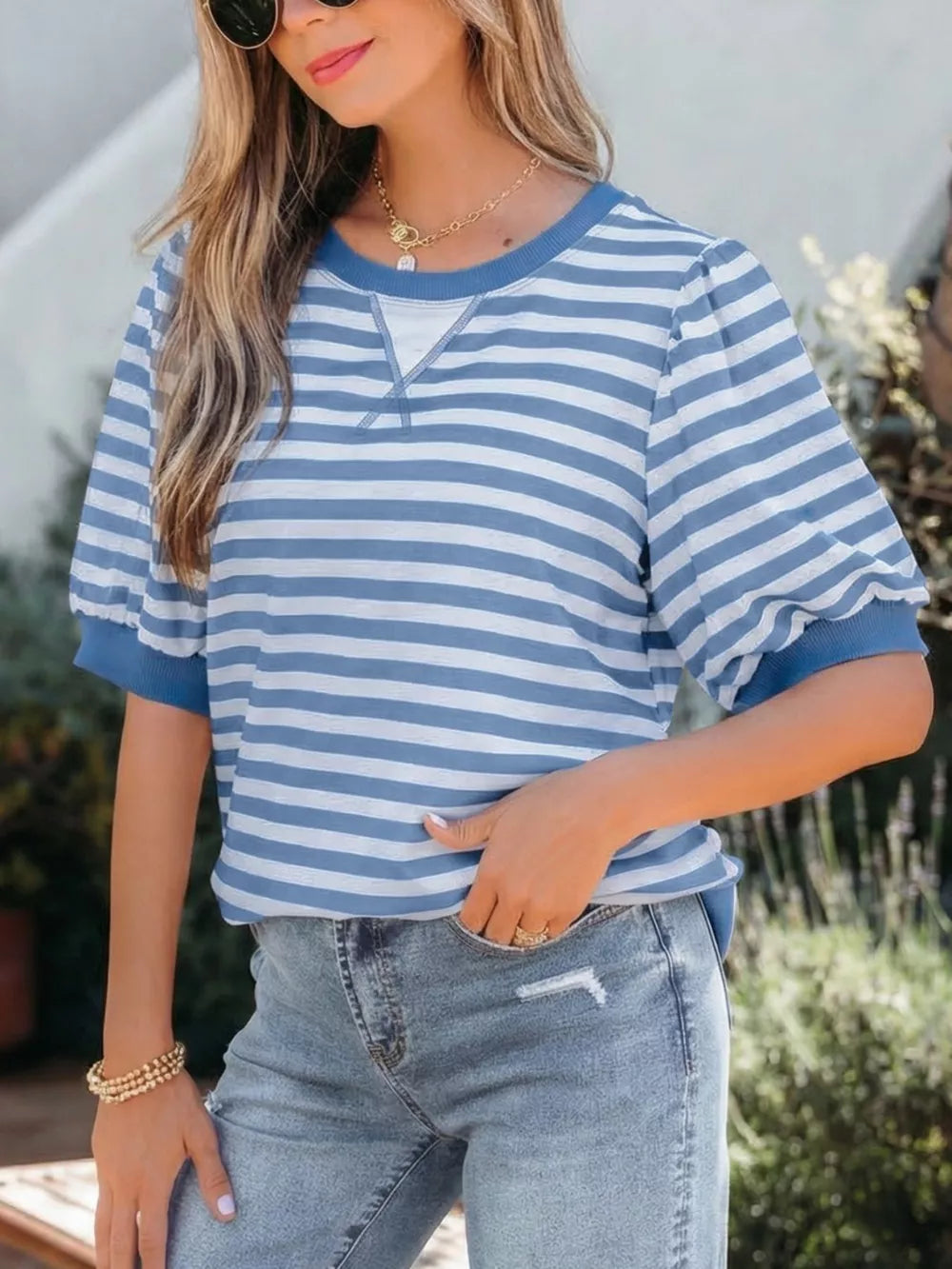 Blue and white striped t-shirt with bubble sleeves and crew neck