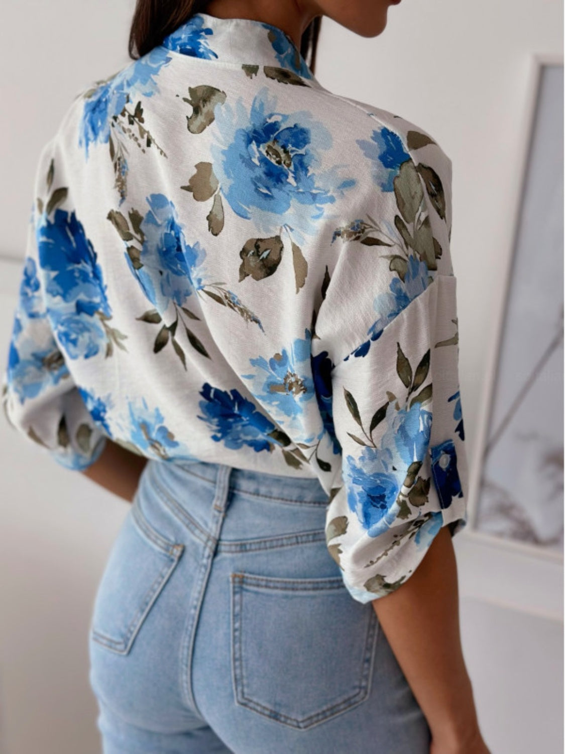 Floral print blouse with mandarin collar and button detail in Royal Blue, casual style.