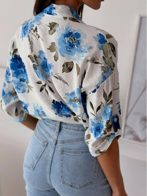 Floral print blouse with mandarin collar and button detail in Royal Blue, casual style.