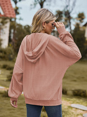 Pale Blush textured knit dolman sleeve hoodie with a relaxed fit.