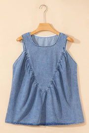 V-shaped pleated denim sleeveless top in light blue with a round neckline.