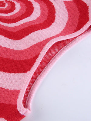 Pink and red striped knit tank top with a wavy pattern and ribbed trim.