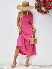 Hot Pink smocked bodice one-shoulder tiered midi dress with puff sleeve.