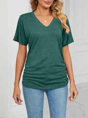 Relaxed dark green V-neck short sleeve t-shirt with ruched sides.