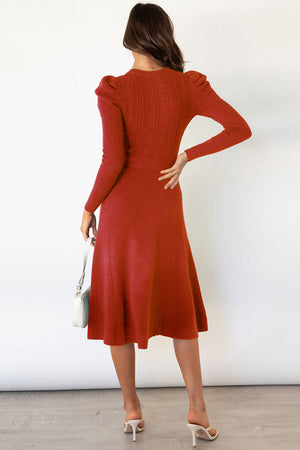 Orange-red cable knit midi dress with puff sleeves and self-tie belt