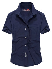 Men's dark blue short sleeve button-down shirt with pocket and cotton fabric.