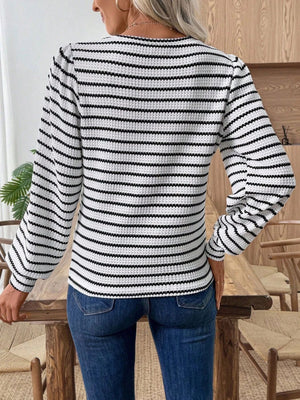Textured knit long-sleeve t-shirt in black and white stripes with a waffle knit texture.