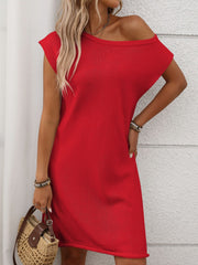 Off-the-shoulder knit shift dress in deep red, with short sleeves and a casual cut.