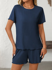 Dark blue ribbed lounge set with raw edge details on crew neck tee and shorts.