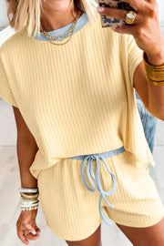 Yellow ribbed cotton crew neck top and drawstring shorts set with blue trim.