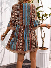Bohemian printed v-neck dress with bell sleeves and lace trim