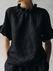Black ruffled neck half-sleeve shirt with gathered details.