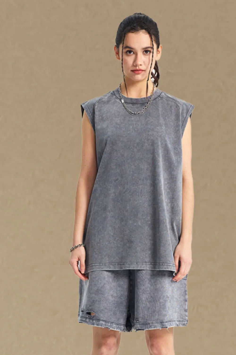 Acid wash relaxed fit tank top in dark gray with a crew neck and sleeveless design.