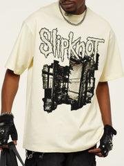 Men's pastel yellow distressed graphic t-shirt with crew neck and short sleeves.