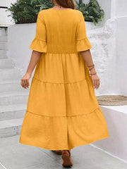 Yellow crinkled midi dress with ruffle sleeves and tiered skirt