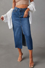 Slit-front raw-hem denim midi skirt in light blue with buttoned closure.