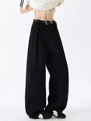 Men's black 100% cotton oversized wide-leg jeans with a belt.