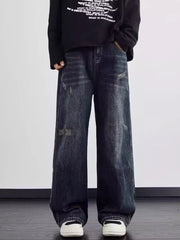 Men's dark wash wide leg jeans with distressed details and a relaxed fit.