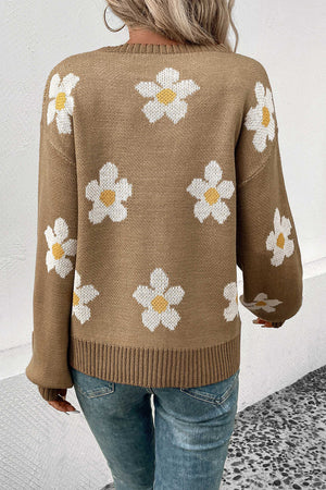 Khaki acrylic sweater with white daisy motif and balloon sleeves.