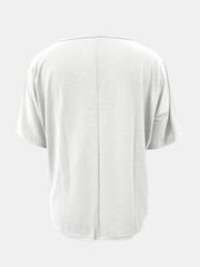 White relaxed v-neck dolman sleeve tee with textured fabric and center back seam.