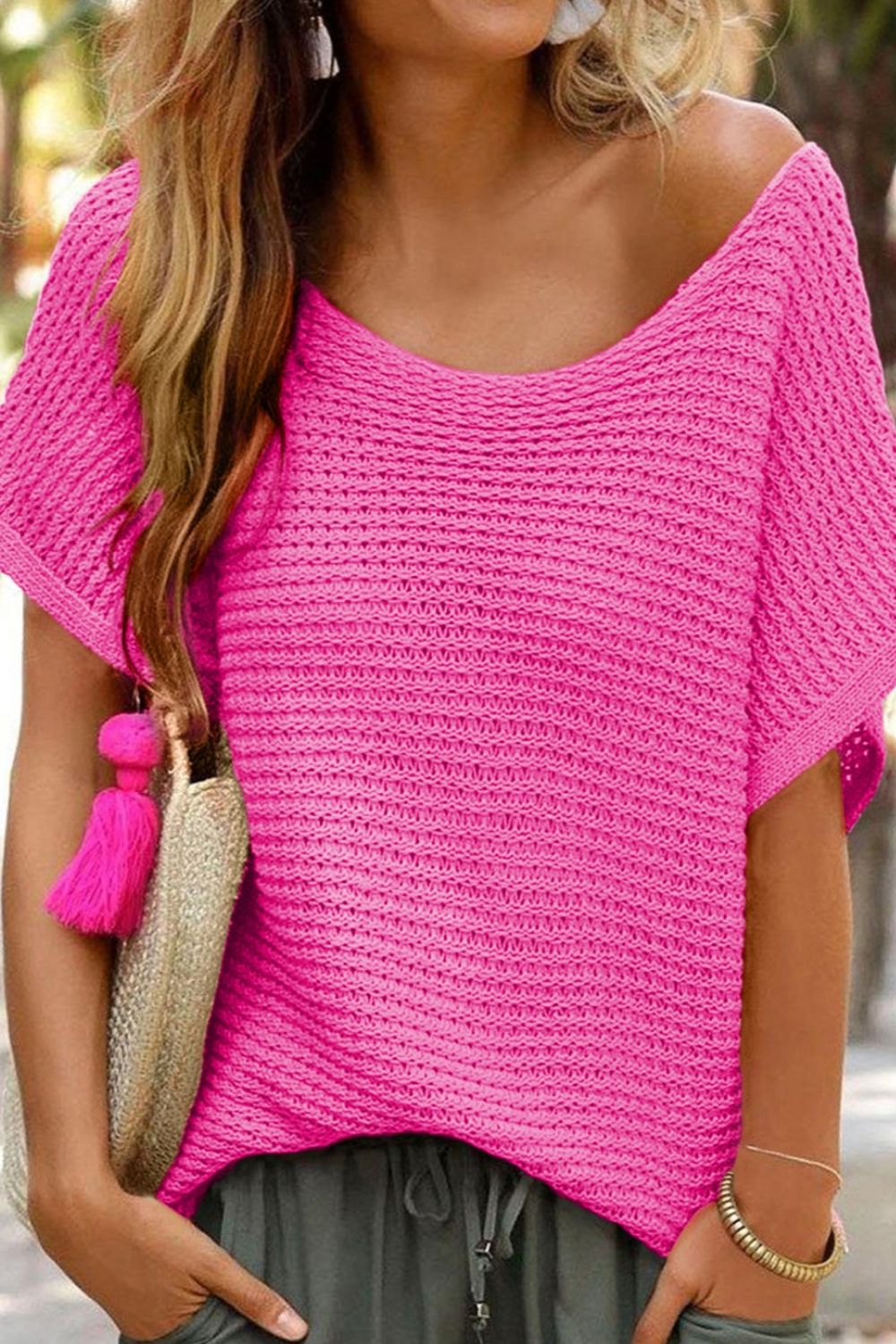 Hot Pink open-knit dolman sleeve top with a boat neckline.
