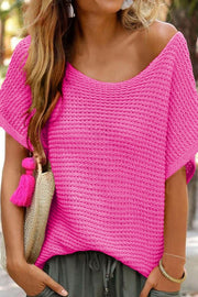 Hot Pink open-knit dolman sleeve top with a boat neckline.