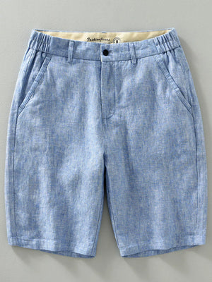 Light blue chino shorts with elastic waistband and pockets.