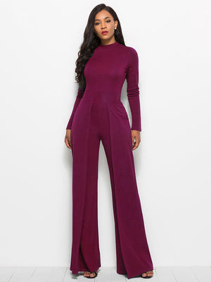 Wine high-waisted palazzo jumpsuit with slit front and long sleeves.