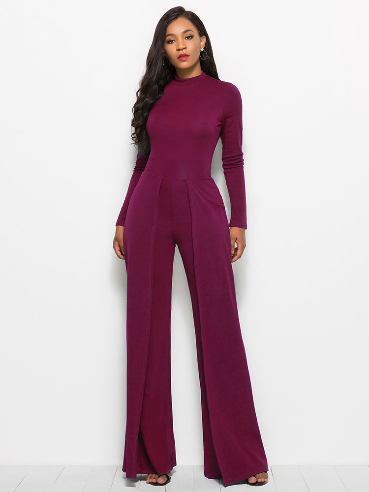 Wine high-waisted palazzo jumpsuit with slit front and long sleeves.