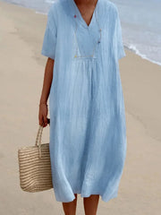 V-neck casual midi dress in blue with short sleeves and a relaxed fit, perfect for beachwear.