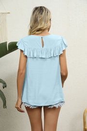 Light blue blouse with ruffle sleeves and yoke detail, back view