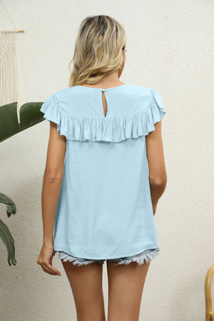 Light blue blouse with ruffle sleeves and yoke detail, back view