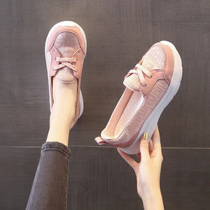 Dusty pink mesh and leather slip-on flats with white platform soles.