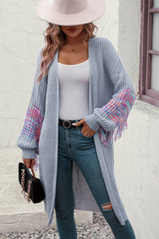 Cloudy Blue textured sleeve fringe cardigan with colorful patterned sleeves and fringe detail.