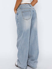 Light blue wide-leg denim jeans with contrast stitching and a relaxed fit.
